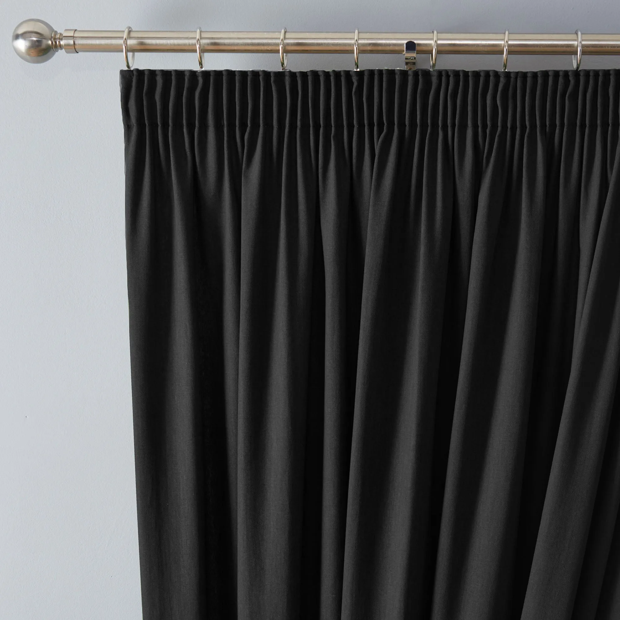 Dijon Pair of Pencil Pleat Curtains by Fusion in Black